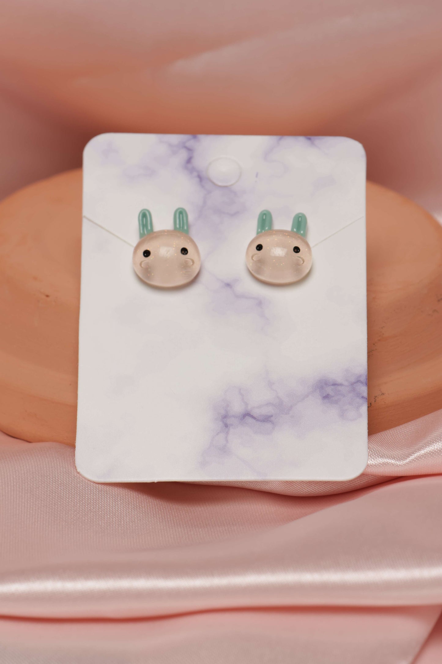 Sparkly Peach Bunny Studded Earrings by When The Sun Doth Sleep