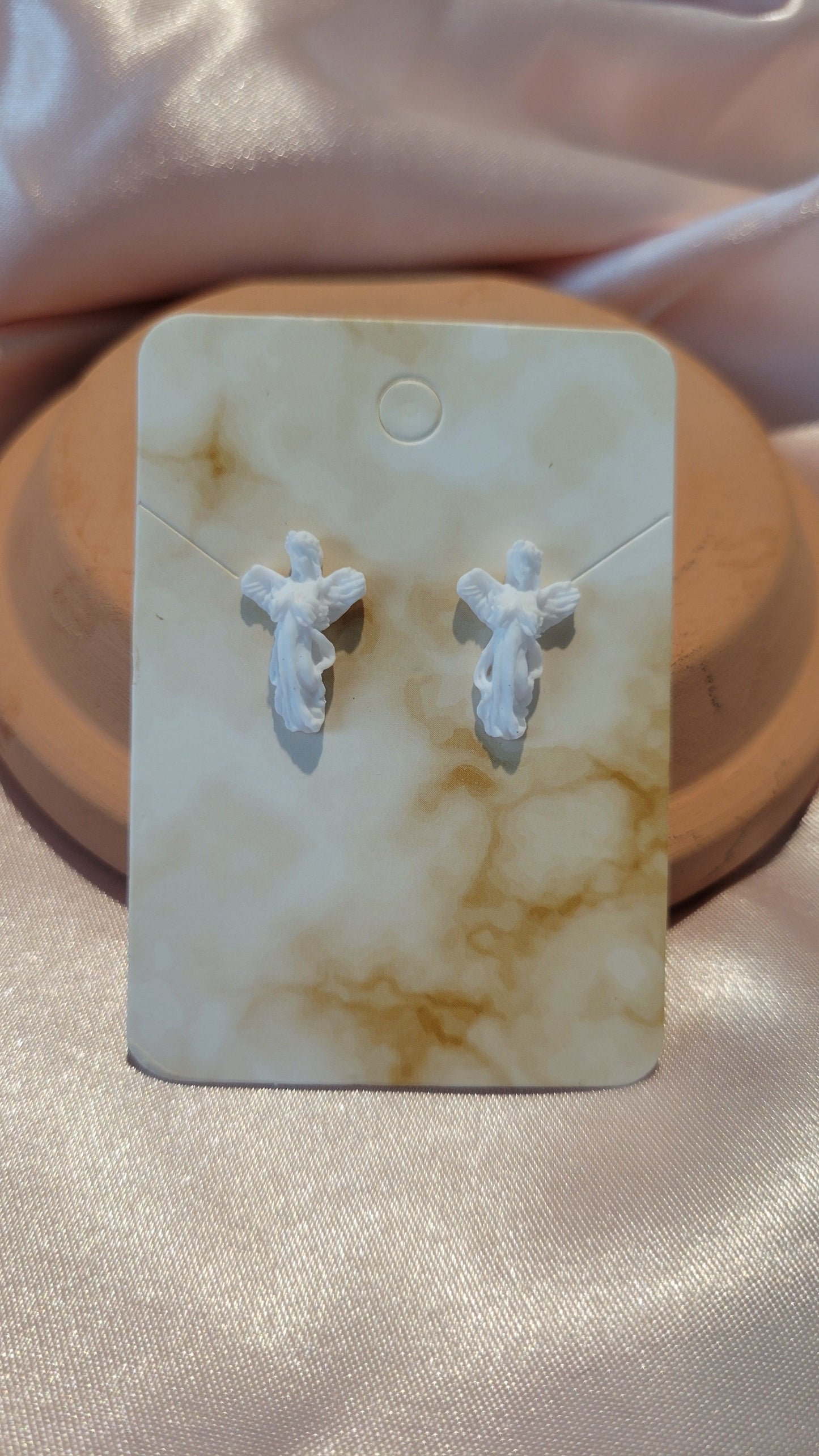 Angel Studded Earrings (White) by When The Sun Doth Sleep