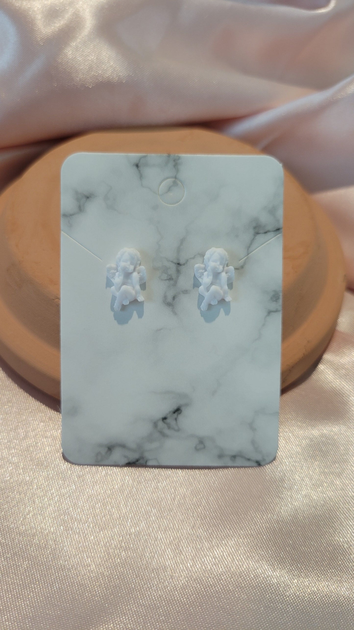 Angel Studded Earrings (White) by When The Sun Doth Sleep