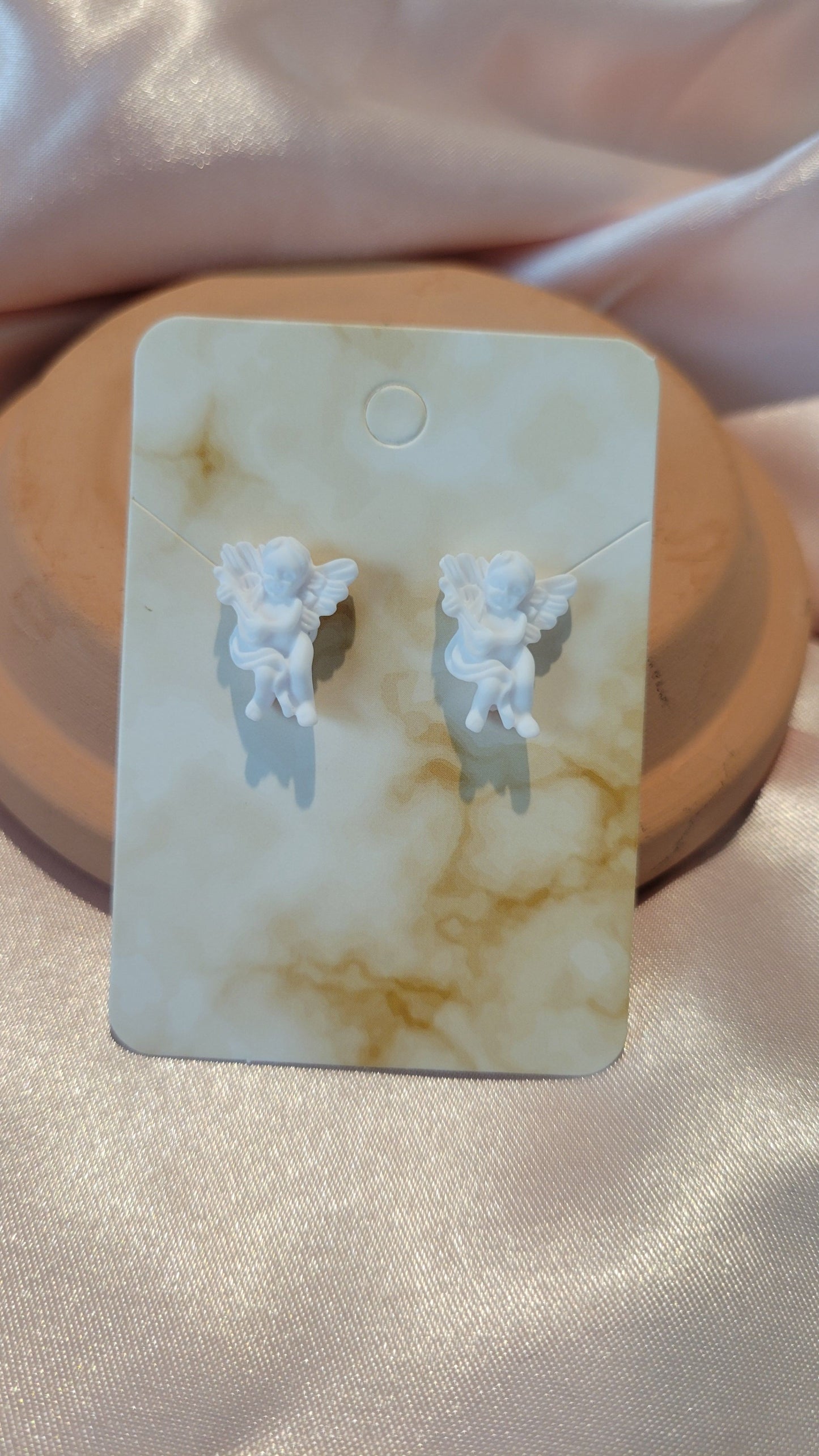 Angel Studded Earrings (White) by When The Sun Doth Sleep